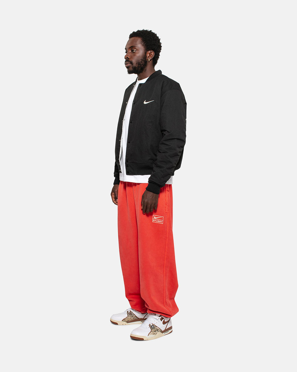 STUSSY x NIKE 聯名雙面穿衍縫鋪棉夾克
