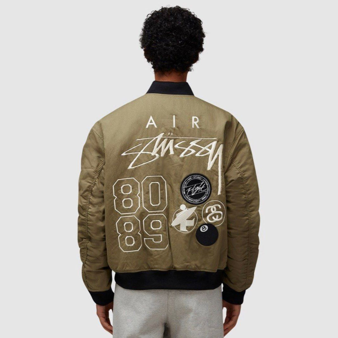 STUSSY x NIKE 聯名雙面穿衍縫鋪棉夾克