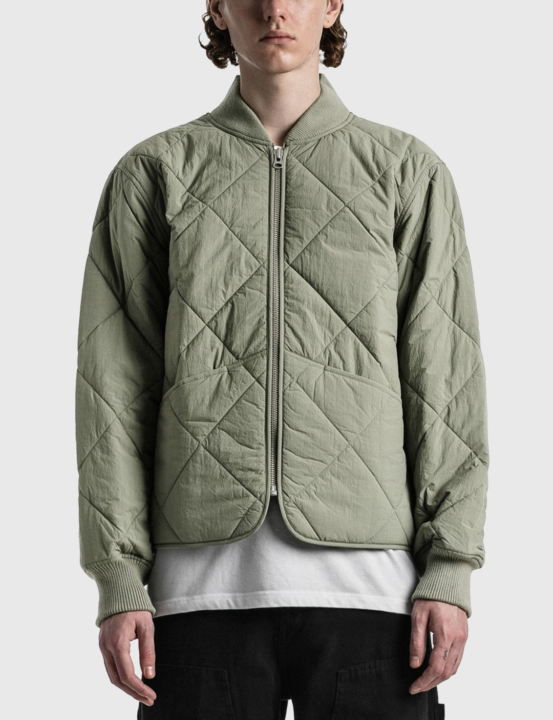 Stussy 菱格紋衍縫鋪棉夾克