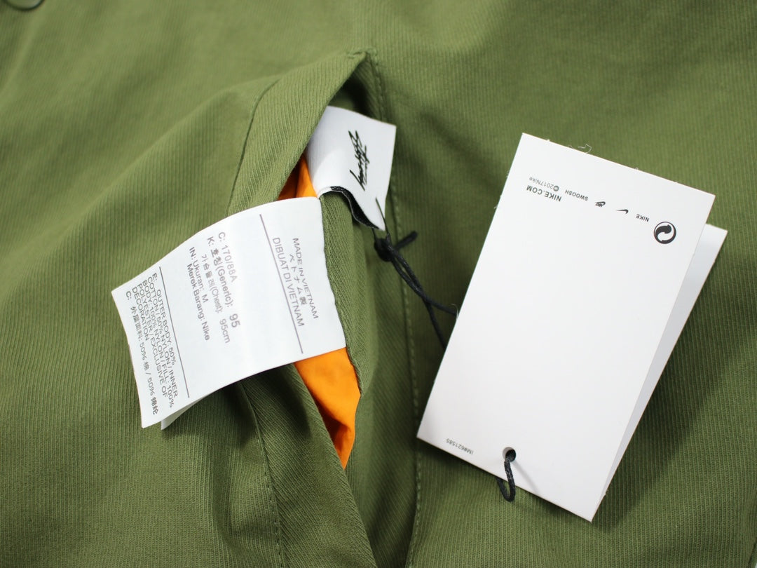 STUSSY x NIKE 聯名雙面穿衍縫鋪棉夾克