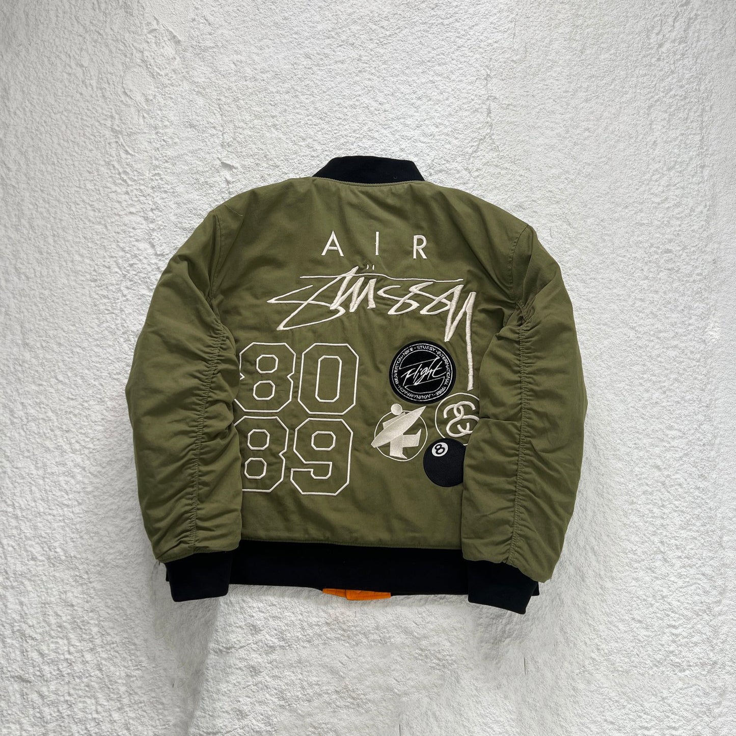 STUSSY x NIKE 聯名雙面穿衍縫鋪棉夾克