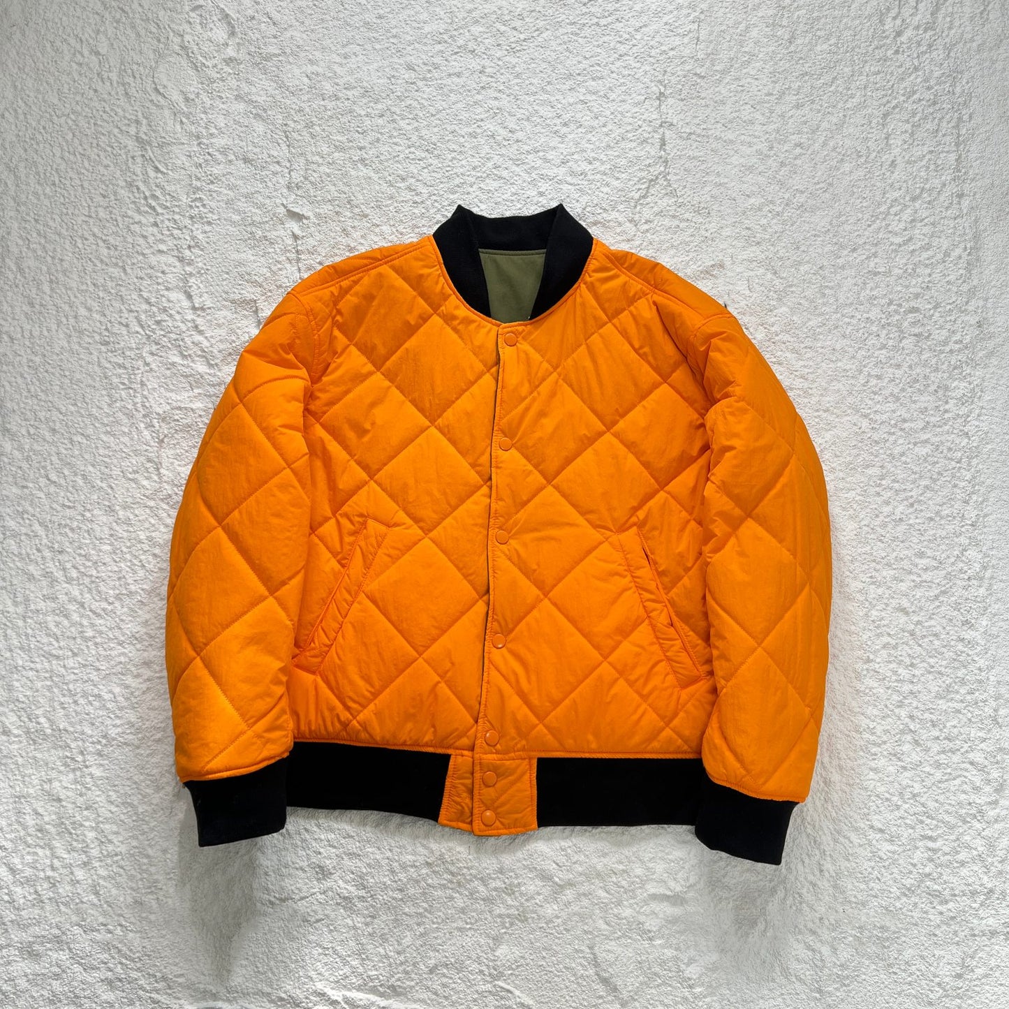 STUSSY x NIKE 聯名雙面穿衍縫鋪棉夾克