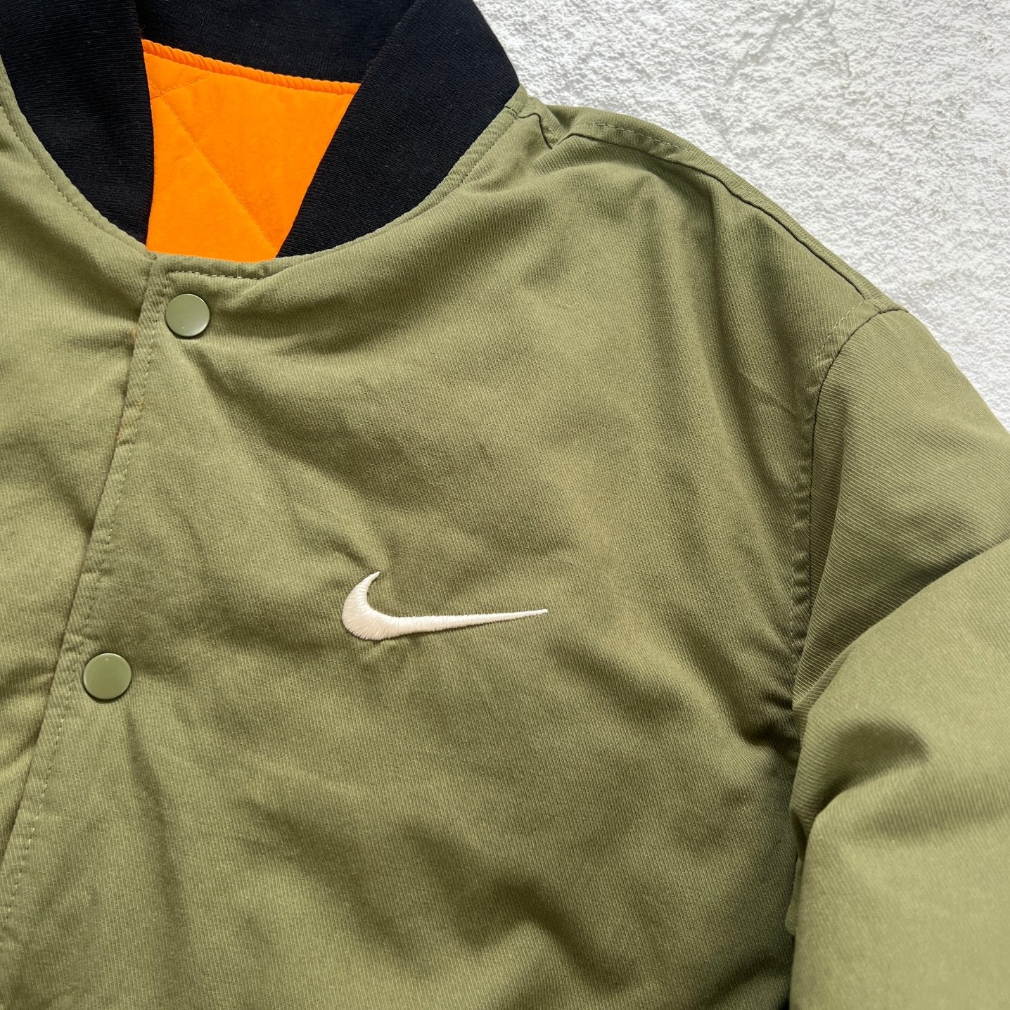 STUSSY x NIKE 聯名雙面穿衍縫鋪棉夾克