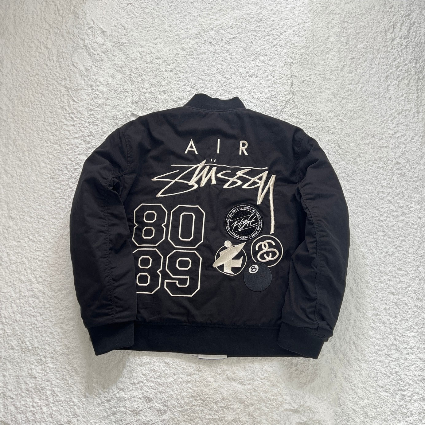 STUSSY x NIKE 聯名雙面穿衍縫鋪棉夾克
