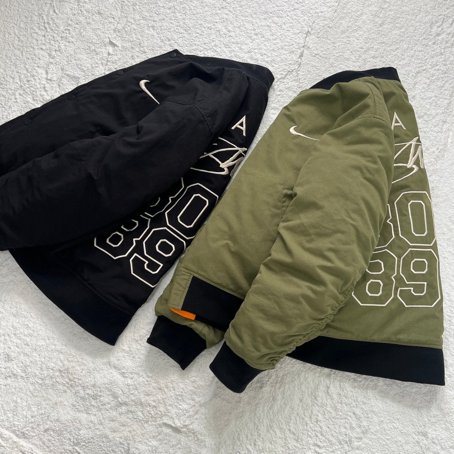 STUSSY x NIKE 聯名雙面穿衍縫鋪棉夾克
