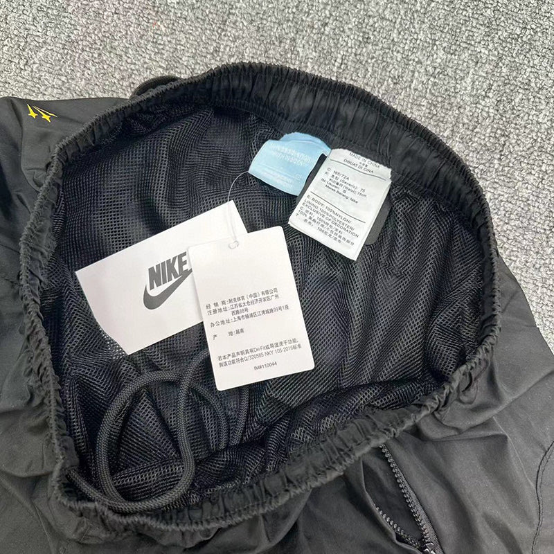 NIKE NOCTA 梭織運動長褲 - VANASH