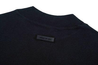 FEAR OF GOD Essentials 2023 黑色系列 黑色微高領字母短袖上衣 - VANASH
